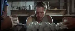 Paul Newman eating raw eggs