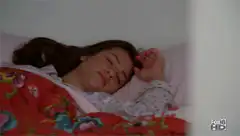 Woman wakes up smiling