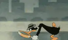 Daffy Duck bowing with hat