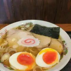 Bowl of ramen with egg and naruto