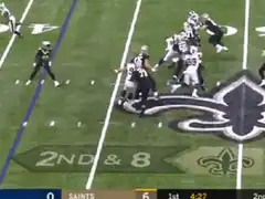 Saints player catches pass and gets tackled