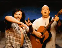 Jack Black and David Koechner Rocking Out