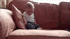 baby falls asleep on couch