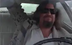 The Dude driving a car