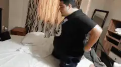 Man does pushups on bed
