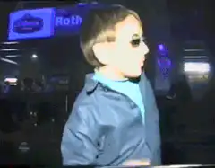 Kid dancing in a club