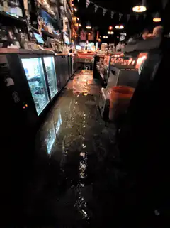 Wet floor in a dark bar