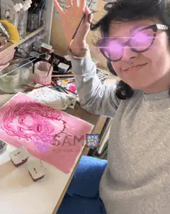 artist beams laser eyes from glasses