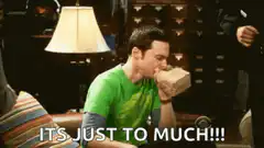 Sheldon eating pizza box overwhelmed