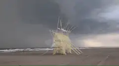 Wicker boat on beach