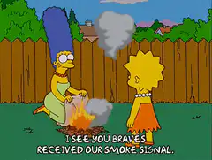 Marge and Lisa as cavewomen with smoke signal
