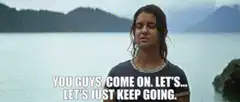 Girl by lake saying let's just keep going