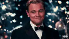 Leonardo DiCaprio raising a glass