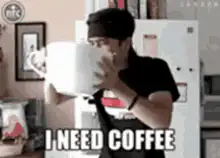 Man drinking from giant coffee mug