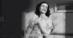 Woman swooning onto bed