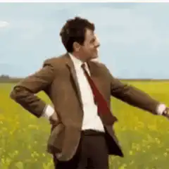 Mr. Bean in a field of yellow flowers