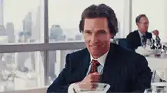 Gordon Gekko eating olives