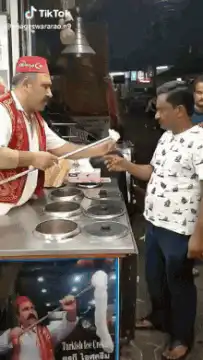 Turkish ice cream vendor tricks customer