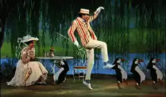 Man dancing with penguins