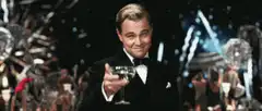 Leonardo DiCaprio toasting with champagne