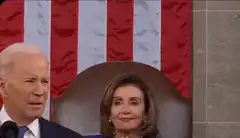 Nancy Pelosi clapping