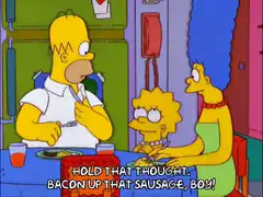 Homer Simpson tells Bart to bacon up that sausage