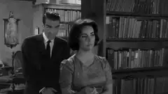 Man and woman in library