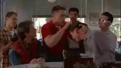 Biff grabs George McFly's face