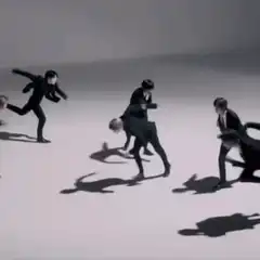 Men in suits running in slow motion