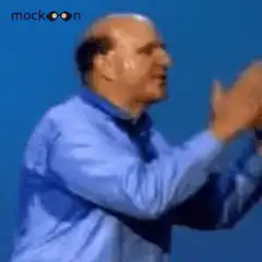 Man in blue shirt clapping