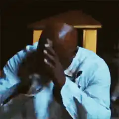 Man facepalming in despair