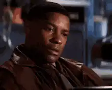 Denzel Washington puts hand on chest