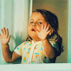 Crying toddler waving hands