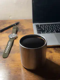 steam rising from coffee cup