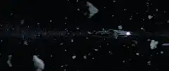 Millennium Falcon flying through asteroid field