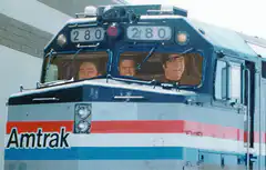 Amtrak train crew smiling