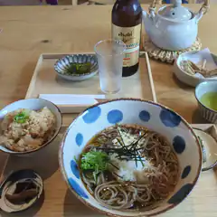 Japanese soba noodle meal with rice and sake