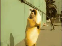 banana man runs past guy