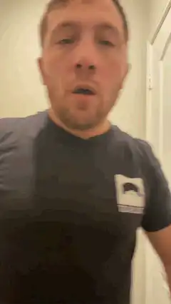 Man in Texas logo shirt talking