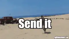 White truck jumps over sand dune