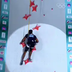 Climber hitting the buzzer