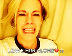 Crying woman saying leave him alone