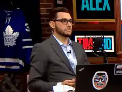 Man holds warning sign F-bombs dropping