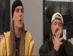 Two guys talking and smoking