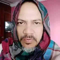 Man in colorful headscarf