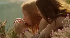 Two girls smoking in heather