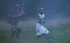 Frodo and Sam walking through the mist