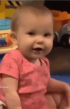 Baby giggling and smiling