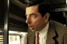 Mr. Bean falls asleep on the train