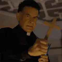 Priest holding cross and knife